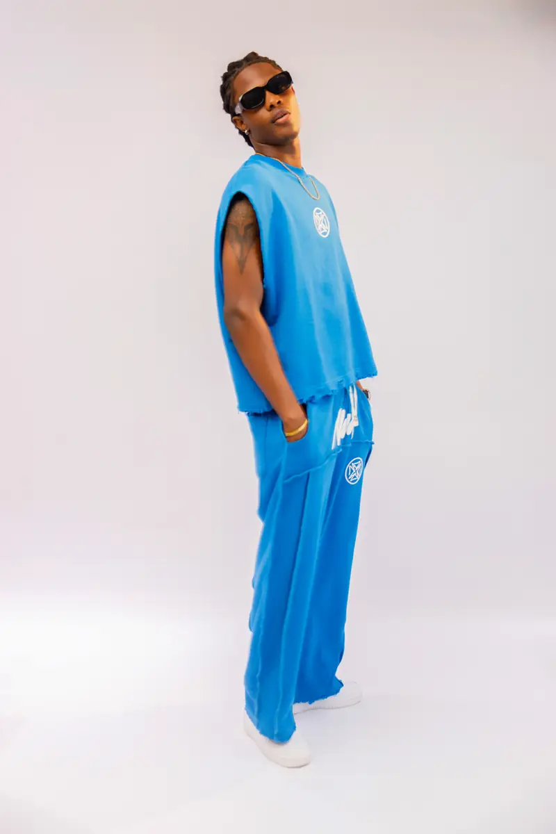 A man with braids in the Cobalt set in the studio