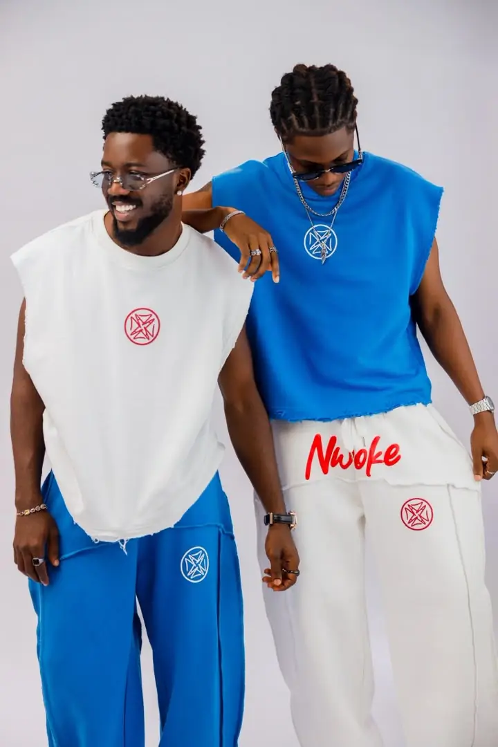Two men wearing the Bone and Cobalt pieces mixed